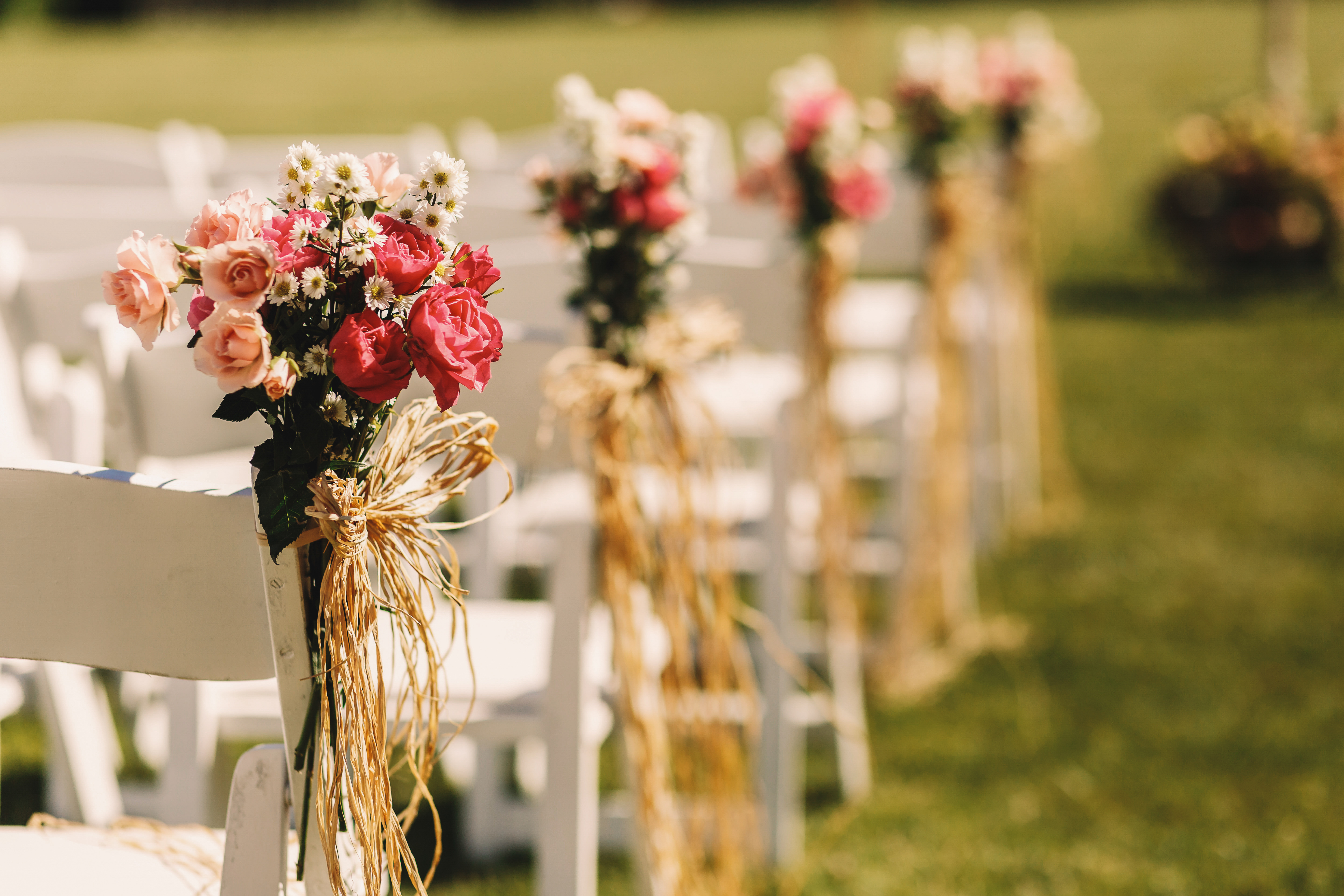 bows-rope-twine-pink-bouquets-white-chairs